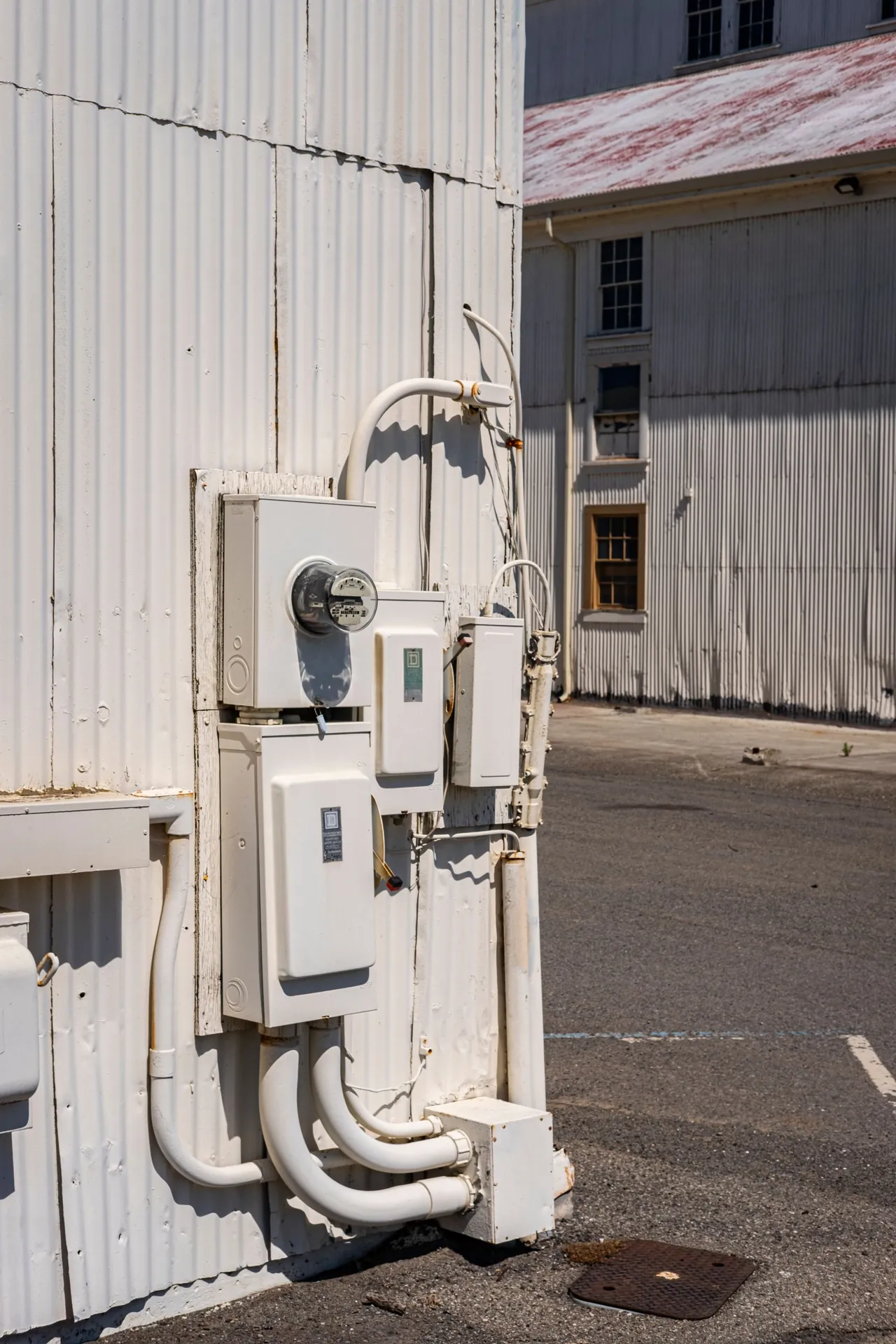 Wall-mounted distribution boards and metering panels