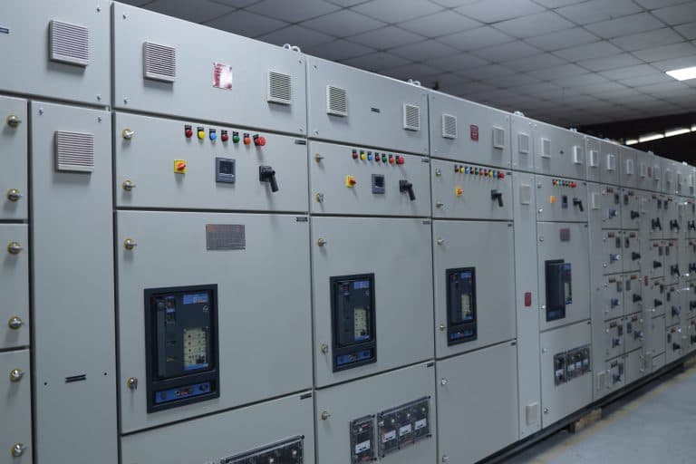 Row of low-tension switchboard cubicles with draw-out breaker compartments