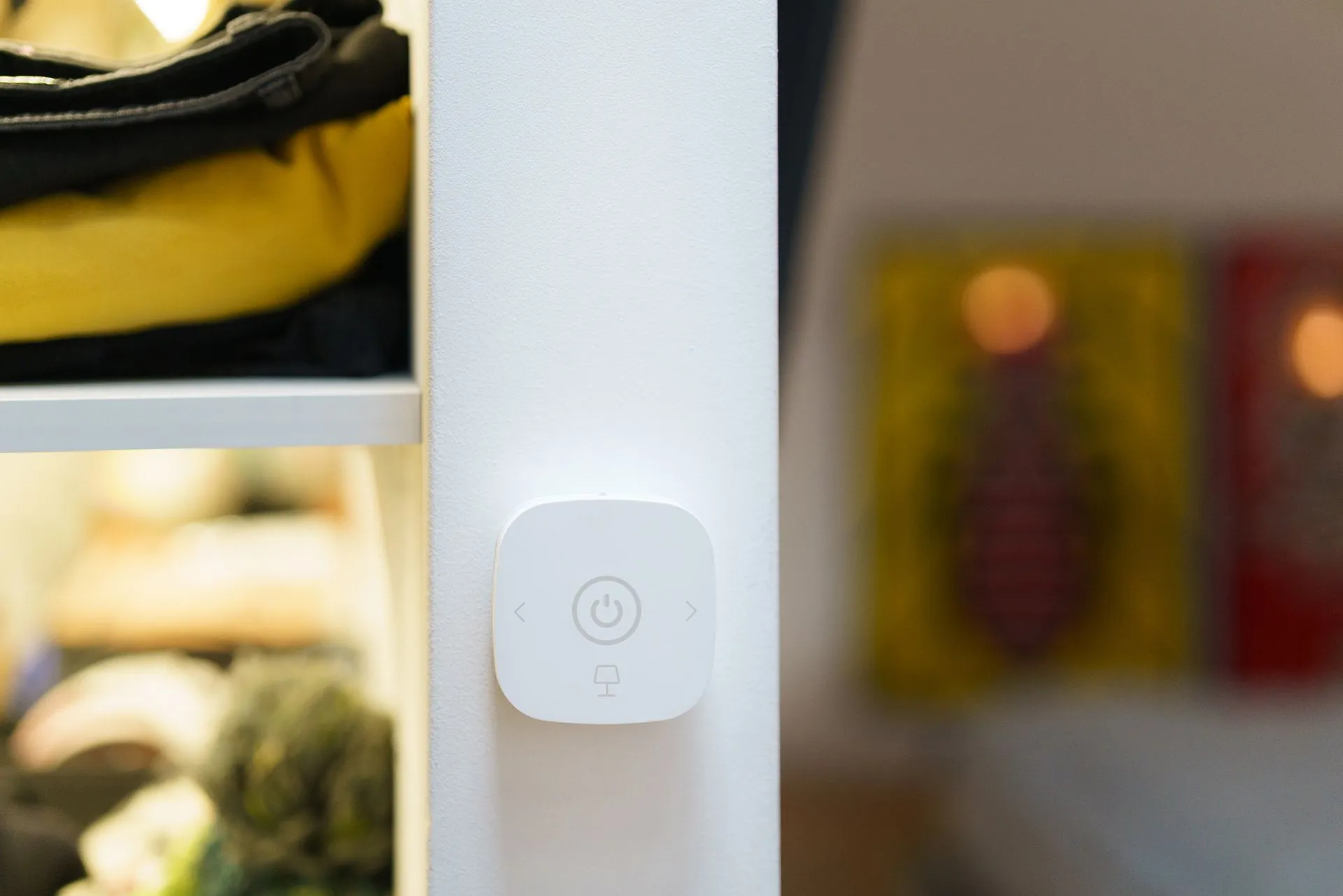 Close-up of a smart home lighting switch in a modern room