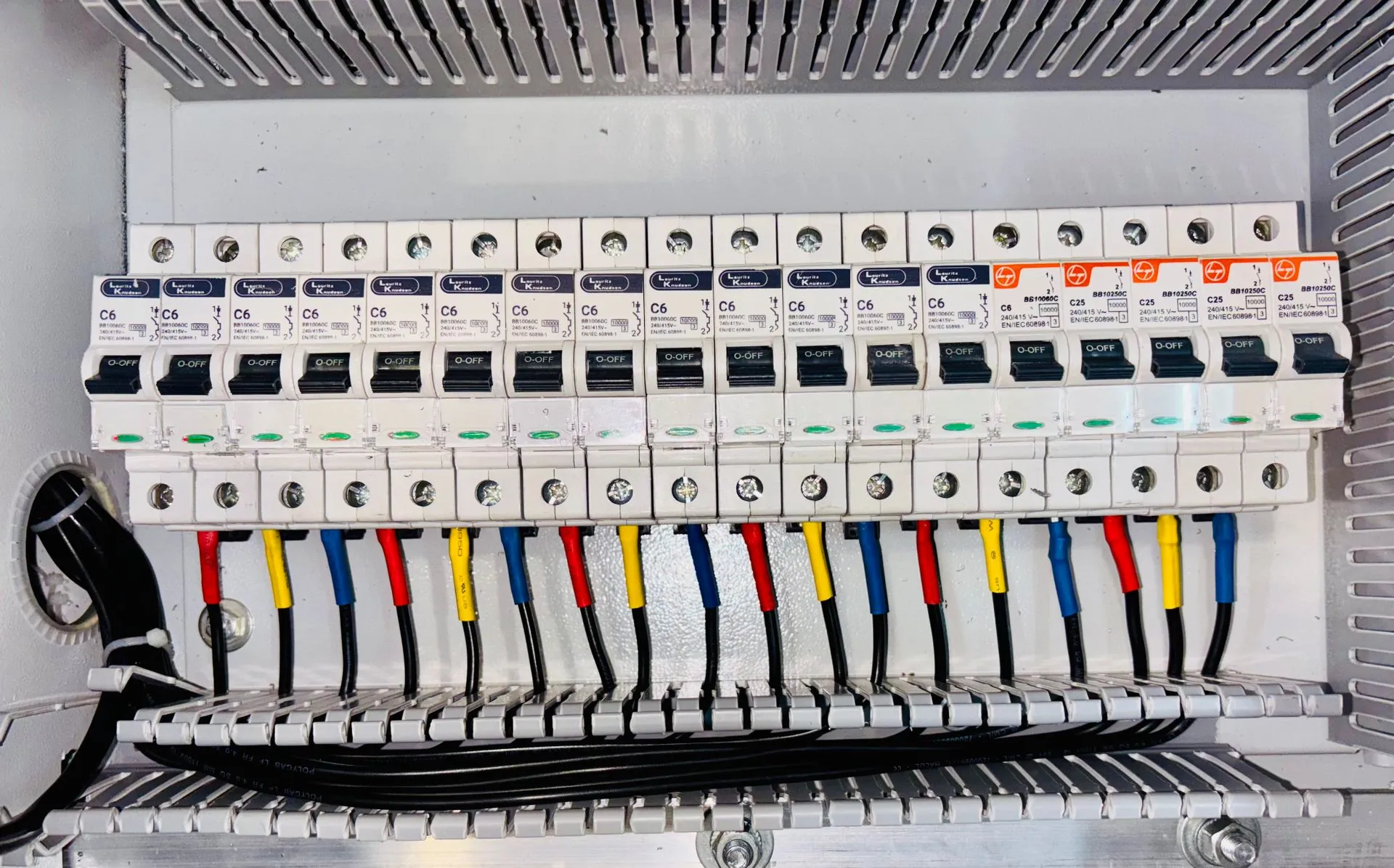 Circuit breaker panel with colour-coded control wiring