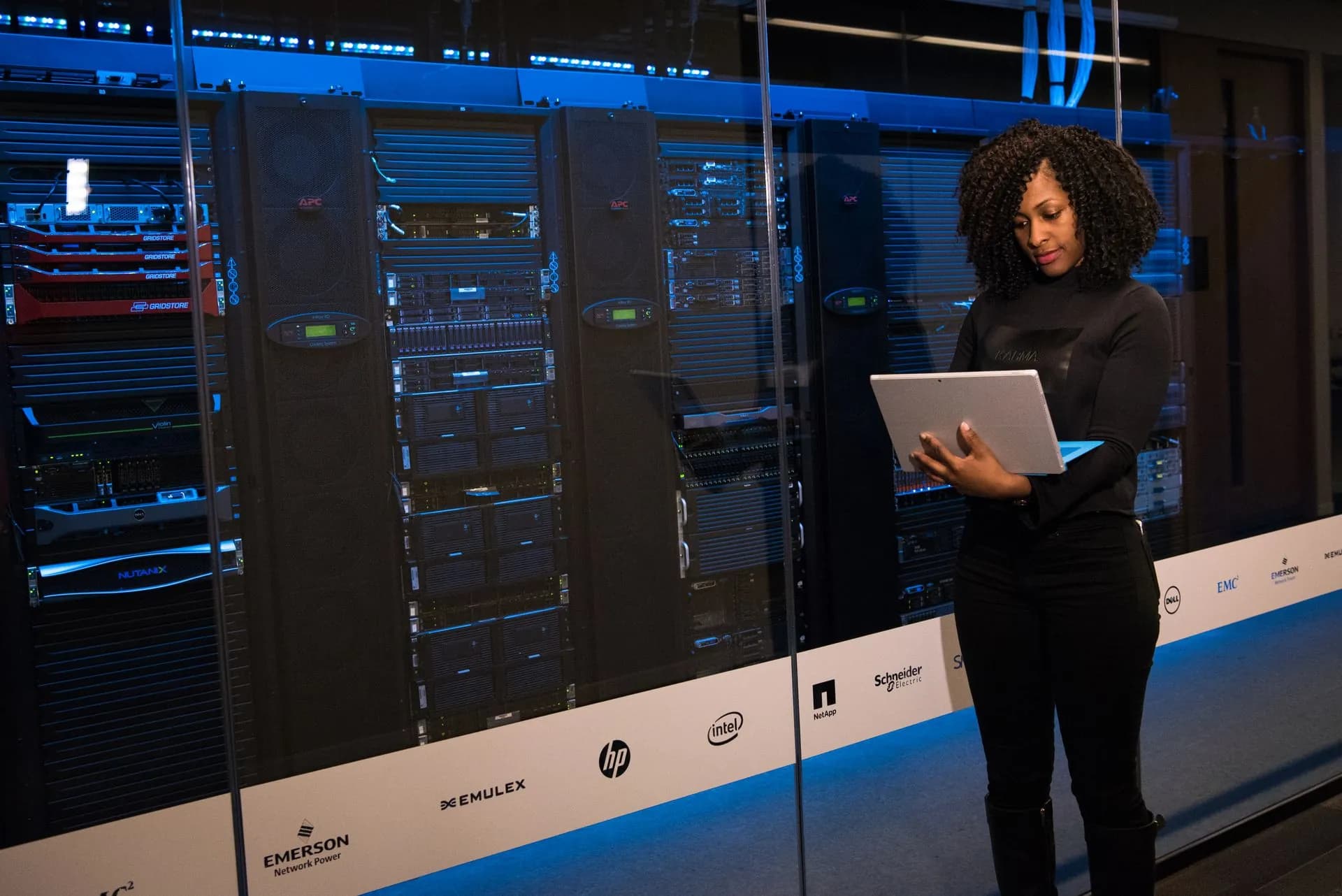 Engineer monitoring servers in a data centre